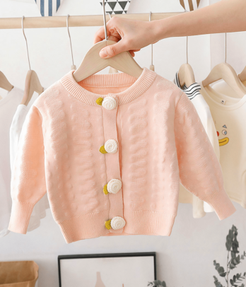 Cardigan tricoté rose pêche