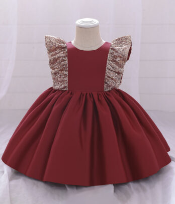 Robe princesse rouge violacé à manches pailletées