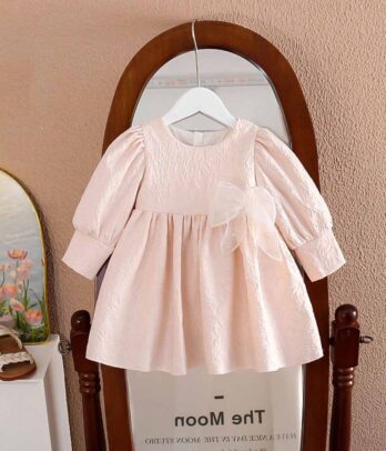 Robe de princesse rose clair à nœud papillon