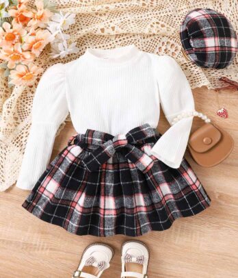 Ensemble de pull blanc et jupe à carreaux noire pour fillettes