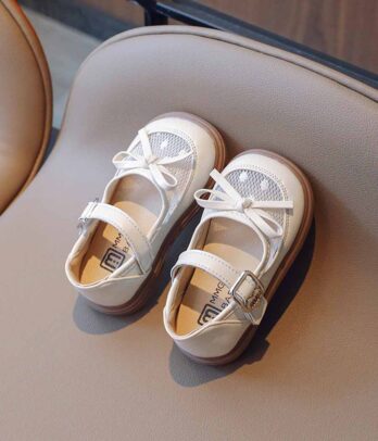 Paire de ballerines blanches à nœuds