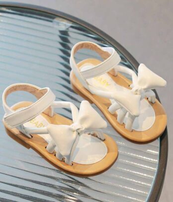 Paire de sandales blanches à nœuds papillons