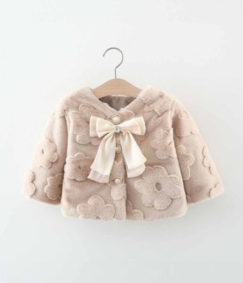 Veste en fourrure à nœud papillon de couleur beige