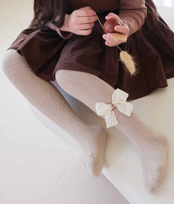 Bas collants à nœud papillon