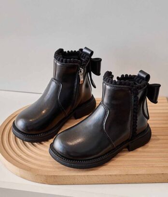 Chaussures d'hiver noires à nœud papillon