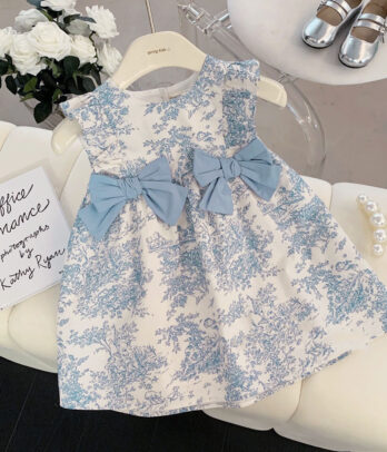 Robe enchantée blanche à fleurs bleues avec nœuds papillons