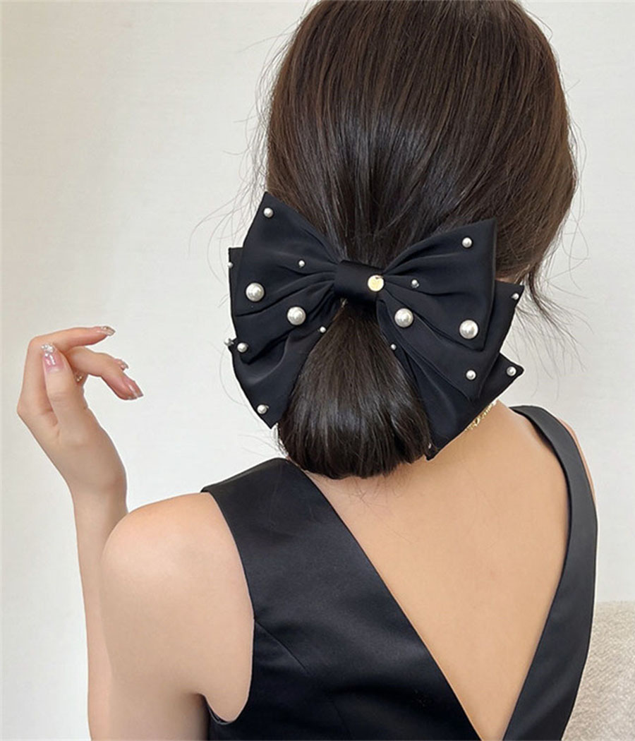 O1CN01raQrG61FnF6cGLN8U_!!2201135030531-0-cib Noeud papillon noir à perles pour cheveux – Image 1