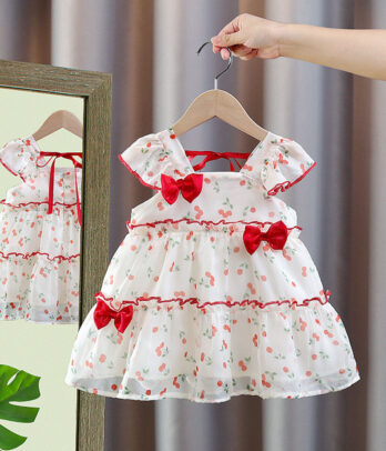 Robe blanc cassé à cerises et noeuds rouges