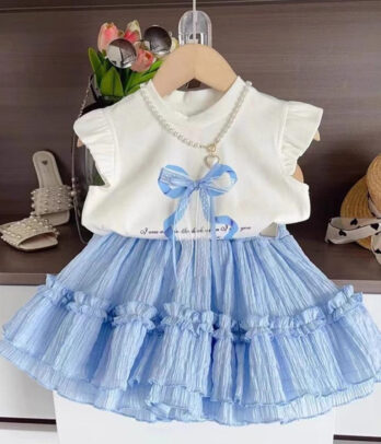Set de jupe bleu et haut blanc à nœud papillon