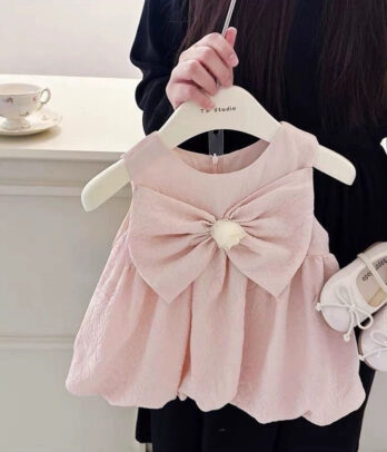 Robe rose sans manches à noeud papillon fantaisie