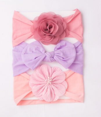 Pack de 3 bandeaux "Arc-en-Ciel" (rose poudré, rose tendre, mauve) en coton extensible avec jolis nœuds façon turban pour un look joyeux et coloré.