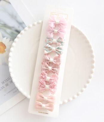 Pack de barrettes à nœuds roses, douces et girly, parfaites pour ajouter une touche de charme délicat aux coiffures du quotidien, des fêtes ou des séances photo.