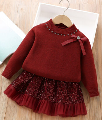 Ensemble de pull en laine et jupe pailleté rouge festif