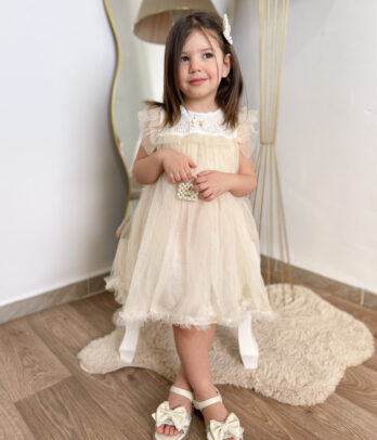 Robe bébé écru chic avec volants