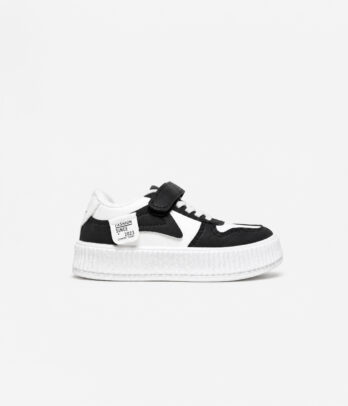 Basket bicolore noir et blanc à scratch style skate